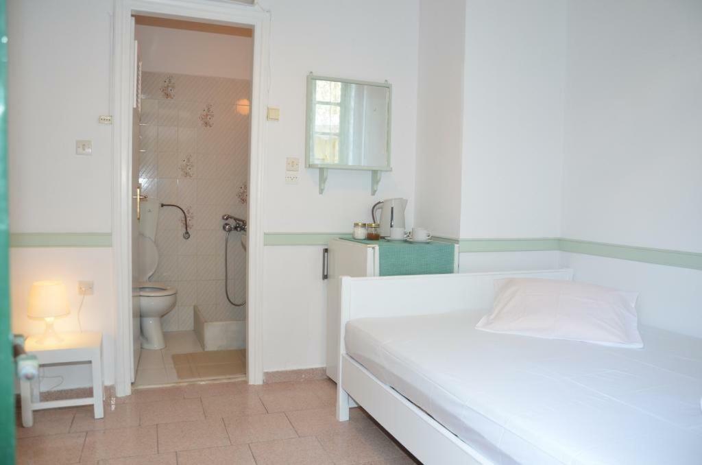Aegli Rooms Тинос Экстерьер фото